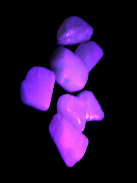 Small polished Kunzite crystals 6-8g in UV light