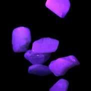 Small polished Kunzite crystals 6-8g in UV light