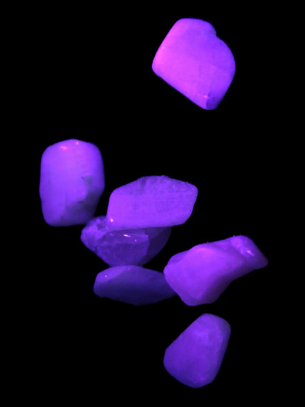 Small polished Kunzite crystals 6-8g in UV light