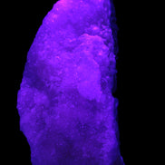 Pink Aragonite specimen on Ironstone matrix 150*22*75mm 336g in UV light -  Rocks and Things Store