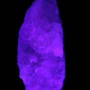 Pink Aragonite specimen on Ironstone matrix 150*22*75mm 336g in UV light -  Rocks and Things Store