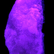 Pink Aragonite specimen on Ironstone matrix 150*22*75mm 336g in UV light -  Rocks and Things Store