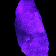 Pink Aragonite specimen on Ironstone matrix 150*22*75mm 336g in UV light -  Rocks and Things Store