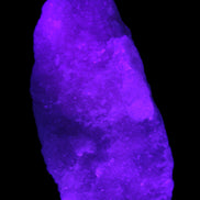 Pink Aragonite specimen on Ironstone matrix 150*22*75mm 336g in UV light -  Rocks and Things Store