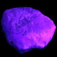 Pink Aragonite specimen on Ironstone matrix 57*24*40mm 116g in UV light - Rocks and Things Store