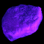 Pink Aragonite specimen on Ironstone matrix 57*24*40mm 116g in UV light - Rocks and Things Store