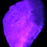 Pink Aragonite specimen on Ironstone matrix 57*24*40mm 116g in UV light - Rocks and Things Store