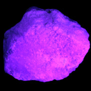 Pink Aragonite specimen on Ironstone matrix 57*24*40mm 116g in UV light - Rocks and Things Store