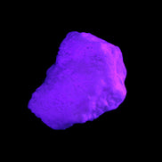 Pink Aragonite specimen from Pakistan 62*22*51mm 76.5g in UV light -  Rocks and Things Store