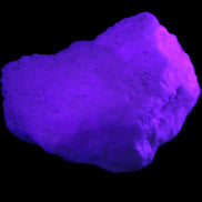 Pink Aragonite specimen from Pakistan 62*22*51mm 76.5g in UV light -  Rocks and Things Store