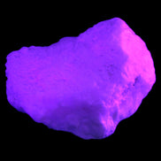 Pink Aragonite specimen from Pakistan 62*22*51mm 76.5g in UV light -  Rocks and Things Store
