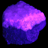 Pink Aragonite specimen on Ironstone matrix 75*45*67mm 462.2g in UV light - Rocks and Things Store