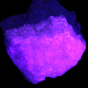 Pink Aragonite specimen on Ironstone matrix 75*45*67mm 462.2g in UV light - Rocks and Things Store