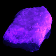 Pink Aragonite specimen on Ironstone matrix 75*45*67mm 462.2g in UV light - Rocks and Things Store