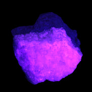 Pink Aragonite specimen on Ironstone matrix 75*45*67mm 462.2g in UV light - Rocks and Things Store