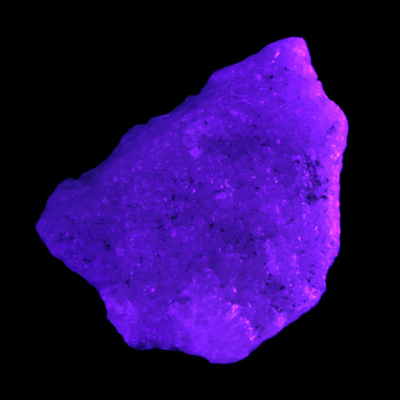 Pink Aragonite specimen from Pakistan 73*15*55mm 83.6g in UV light