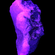 Pink Aragonite specimen on Ironstone matrix  64*26*28mm 70g in UV light - Rocks and Things Store