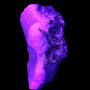 Pink Aragonite specimen on Ironstone matrix  64*26*28mm 70g in UV light - Rocks and Things Store