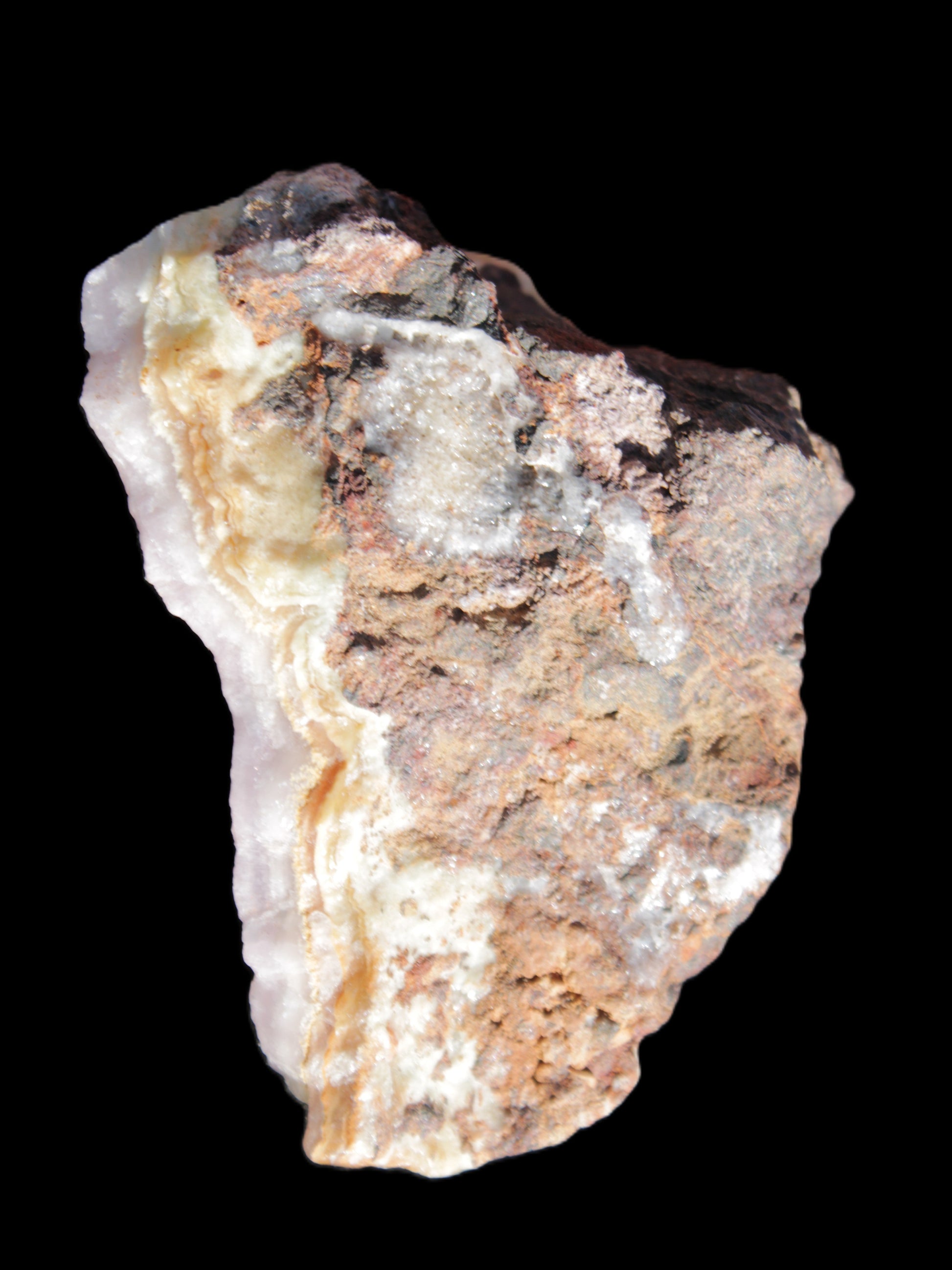 Pink Aragonite specimen on Ironstone matrix 70*35*47mm 127.5g in sunlight - Rocks and Things Store