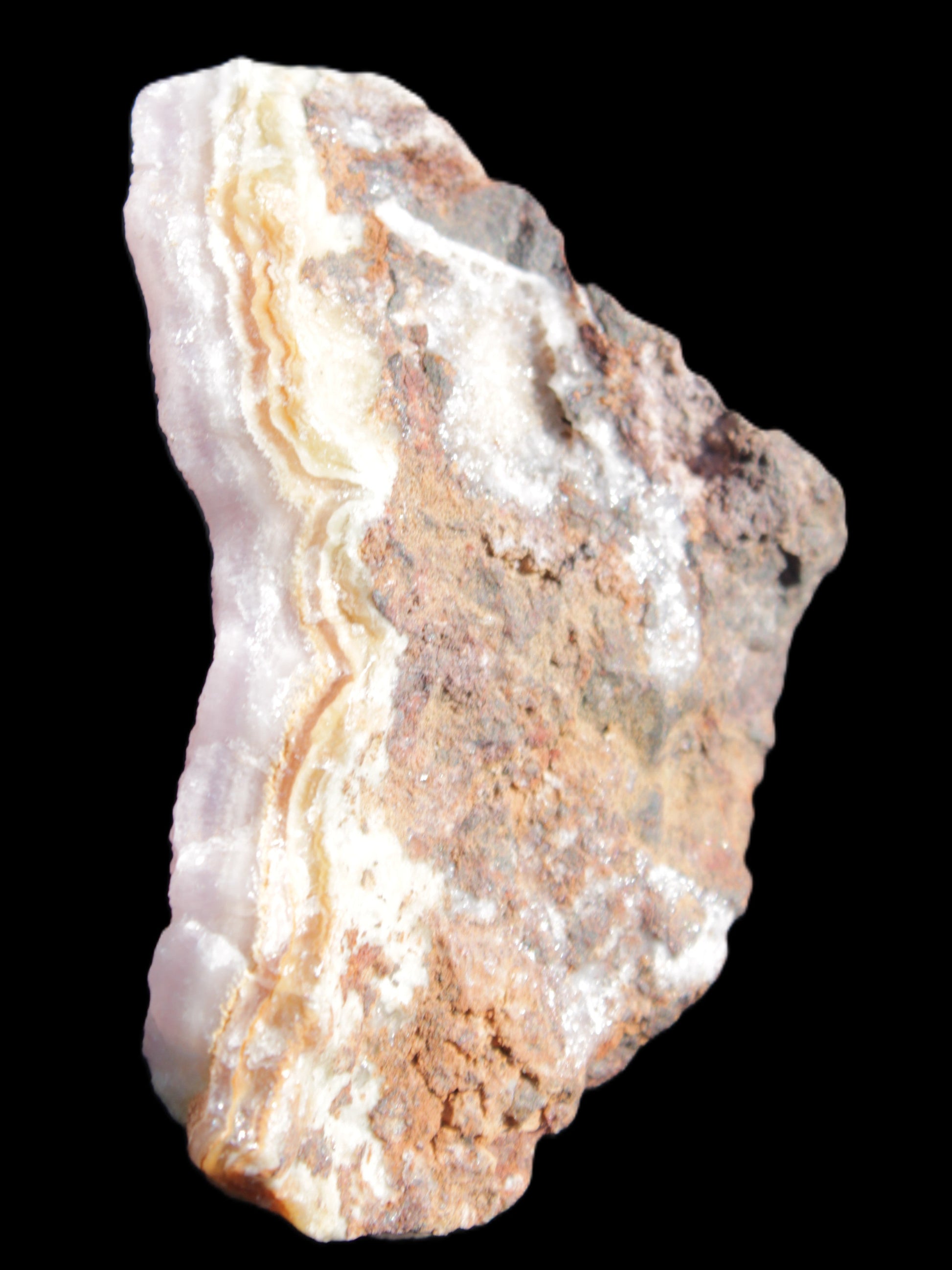 Pink Aragonite specimen on Ironstone matrix 70*35*47mm 127.5g in sunlight - Rocks and Things Store