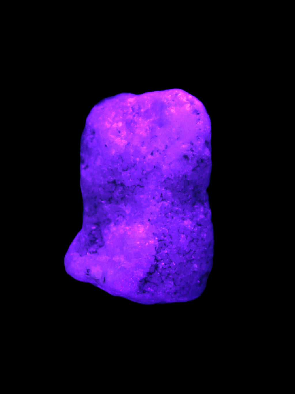 Pink Aragonite specimen on Ironstone matrix  43*22*23mm 49.4g in UV light