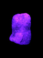 Pink Aragonite specimen on Ironstone matrix  43*22*23mm 49.4g in UV light