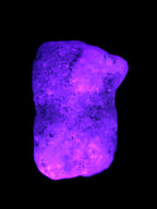 Pink Aragonite specimen on Ironstone matrix  43*22*23mm 49.4g in UV light