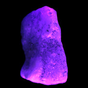 Pink Aragonite specimen on Ironstone matrix  43*22*23mm 49.4g in UV light