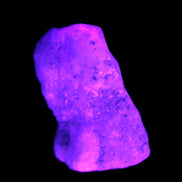 Pink Aragonite specimen on Ironstone matrix  43*22*23mm 49.4g in UV light - Rocks and Things Store