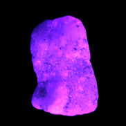 Pink Aragonite specimen on Ironstone matrix  43*22*23mm 49.4g in UV light - Rocks and Things Store