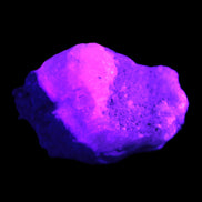 Pink Aragonite specimen on Ironstone matrix  37*30*22mm 46.7g in UV light - Rocks and Things Store