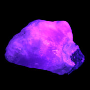 Pink Aragonite specimen on Ironstone matrix  43*16*40mm 49.4g in UV light - Rocks and Things Store