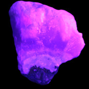 Pink Aragonite specimen on Ironstone matrix  43*16*40mm 49.4g in UV light - Rocks and Things Store