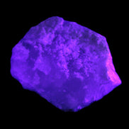 Pink Aragonite specimen on Ironstone matrix  45*10*32mm 25.9g  in UV light    