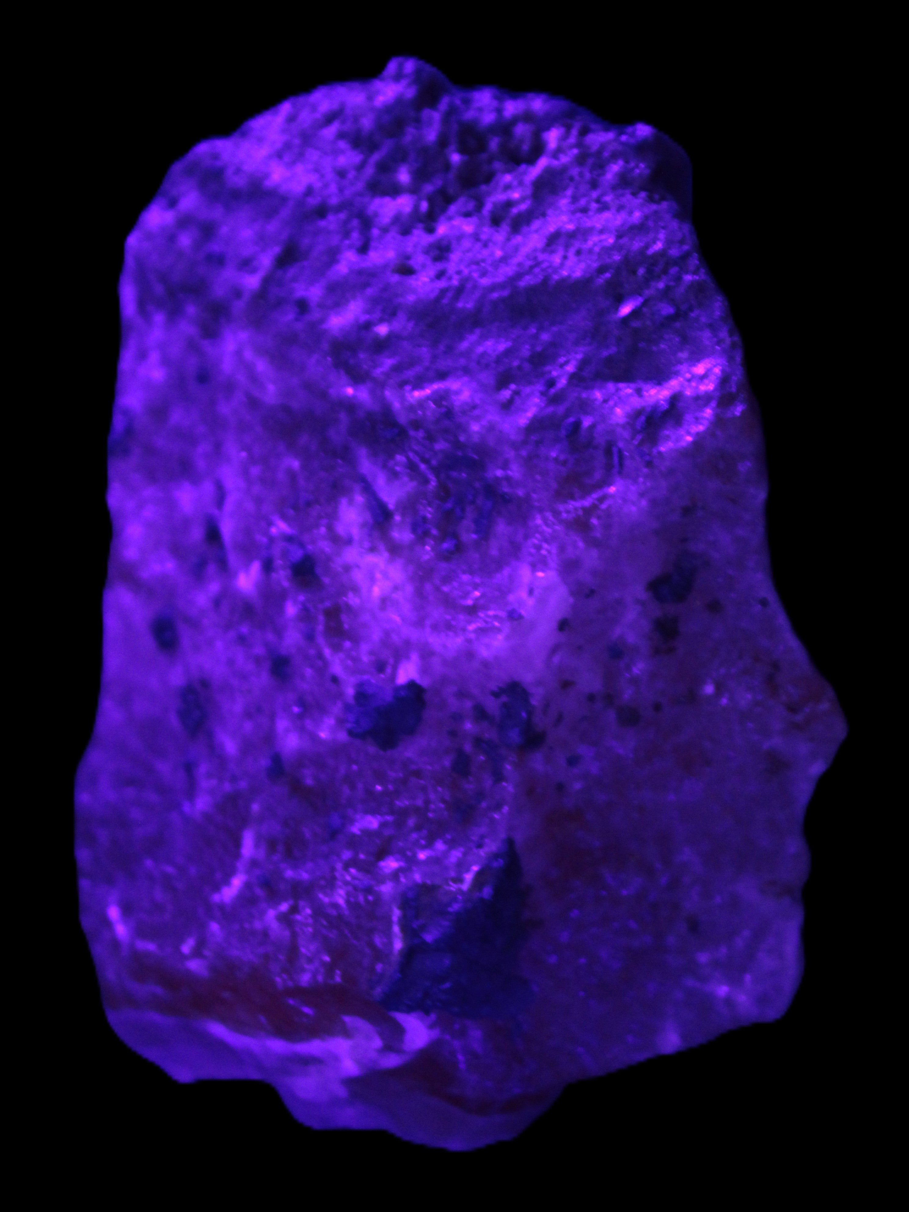 Pink Aragonite specimen from Pakistan 68*16*22mm 128.8g in UV light - Rocks and Things Store