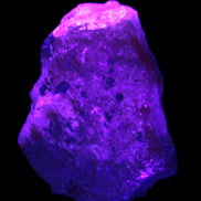 Pink Aragonite specimen from Pakistan 68*16*22mm 128.8g in UV light - Rocks and Things Store