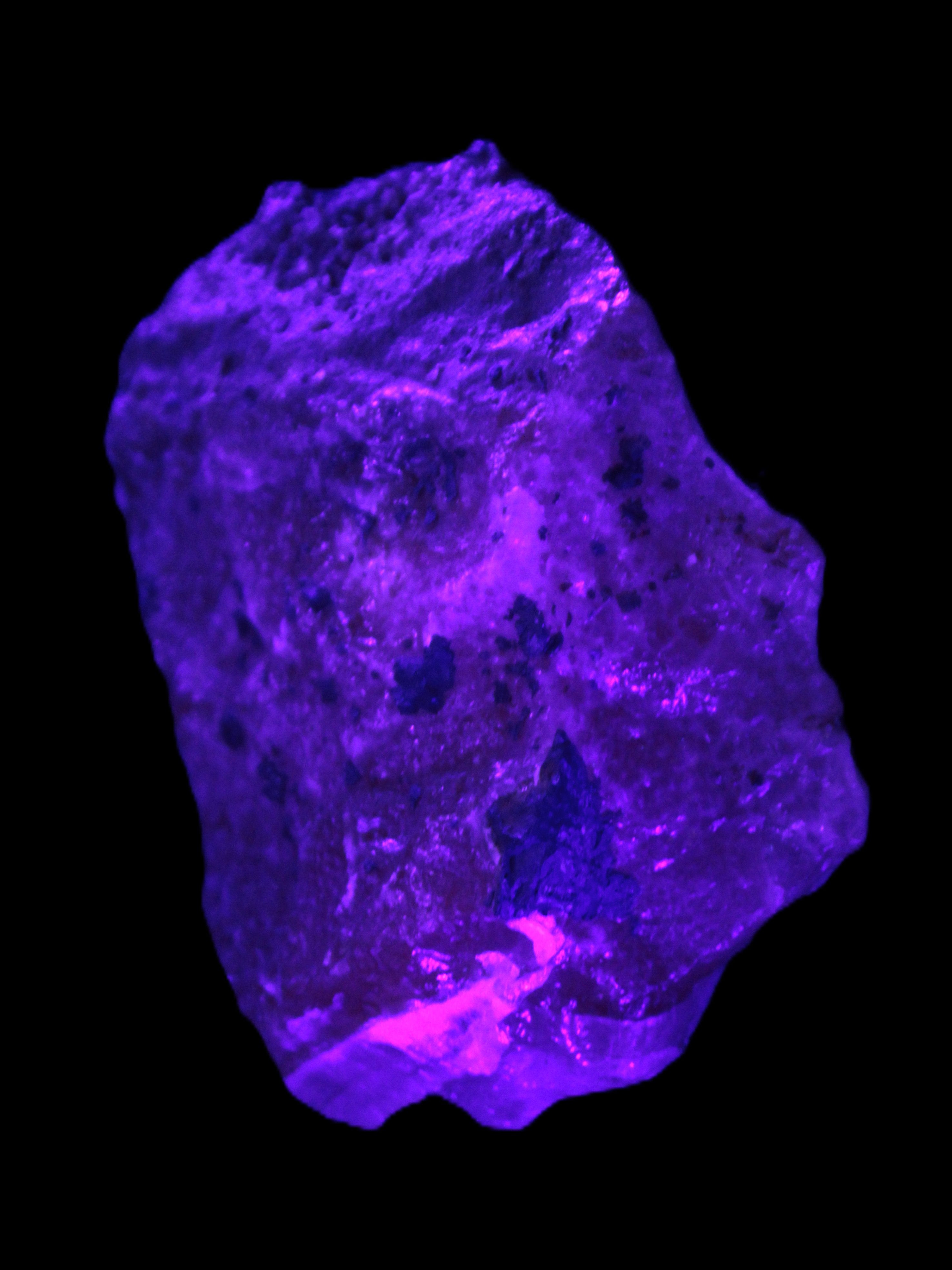 Pink Aragonite specimen from Pakistan 68*16*22mm 128.8g in UV light - Rocks and Things Store