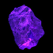 Pink Aragonite specimen from Pakistan 68*16*22mm 128.8g in UV light - Rocks and Things Store