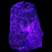 Pink Aragonite specimen from Pakistan 68*16*22mm 128.8g in UV light - Rocks and Things Store