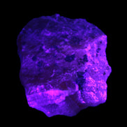 Pink Aragonite specimen from Pakistan 68*16*22mm 128.8g in UV light - Rocks and Things Store