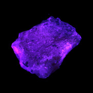 Pink Aragonite specimen from Pakistan 68*16*22mm 128.8g in UV light - Rocks and Things Store