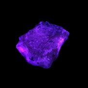 Pink Aragonite specimen from Pakistan 68*16*22mm 128.8g in UV light - Rocks and Things Store