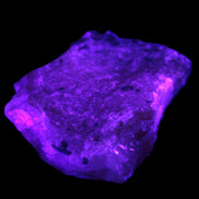 Pink Aragonite specimen from Pakistan 68*16*22mm 128.8g in UV light - Rocks and Things Store