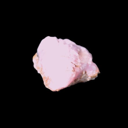 Pink Aragonite specimen 29*13*15mm 13.1g in bright sunlight