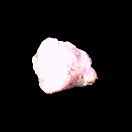 Pink Aragonite specimen 29*13*15mm 13.1g in bright sunlight