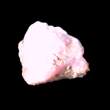 Pink Aragonite specimen 29*13*15mm 13.1g in bright sunlight