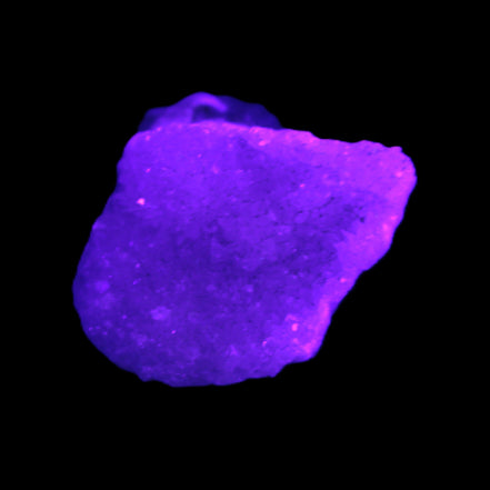 Pink Aragonite specimen 24*19*19mm 13.1g in UV light