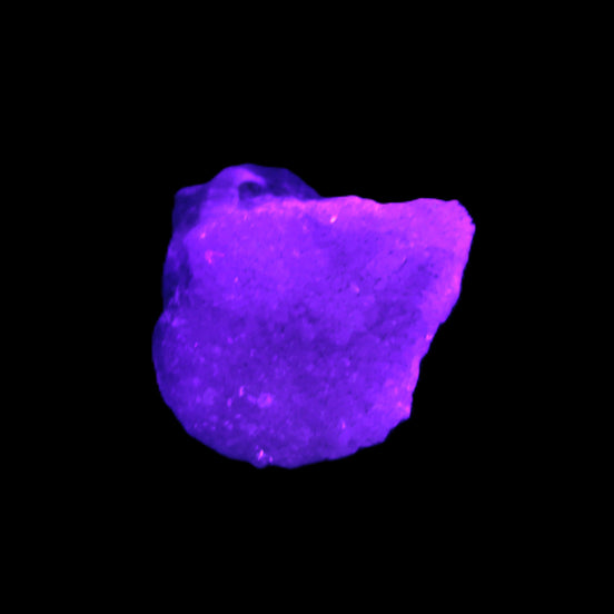 Pink Aragonite specimen 24*19*19mm 13.1g in UV light