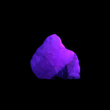 Pink Aragonite specimen from Pakistan 12-21g in UV light Rocks and Things Store