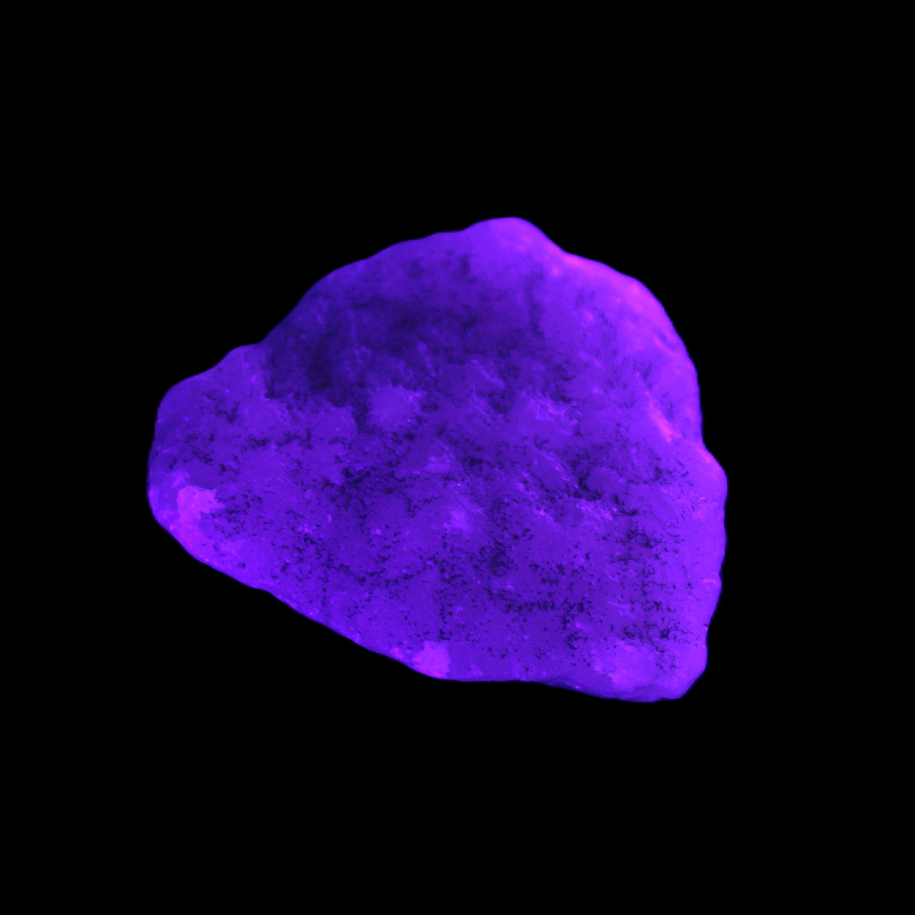 Pink Aragonite specimen 32*15*29mm 21.7g in UV light - Rocks and Things Store
